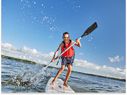 kid paddleboarding